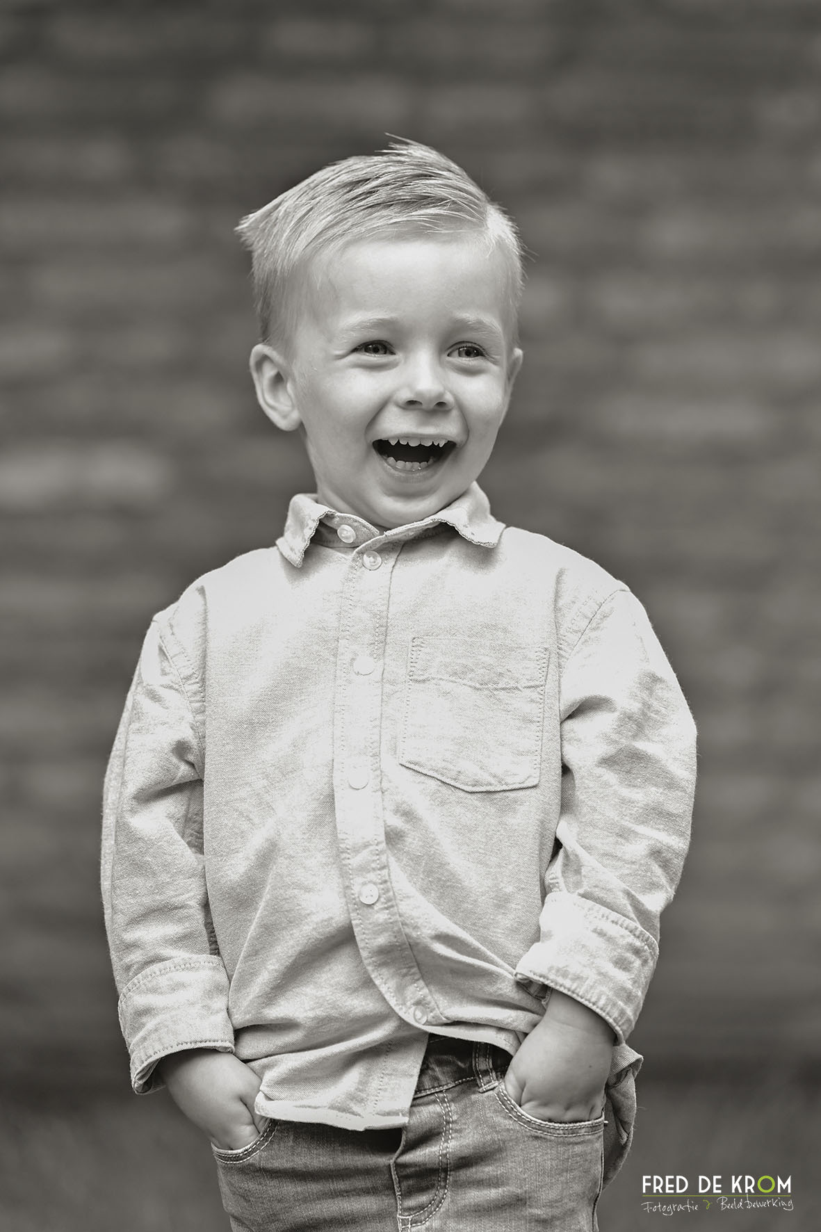 Foto van lachend jongetje in Valkenswaard.